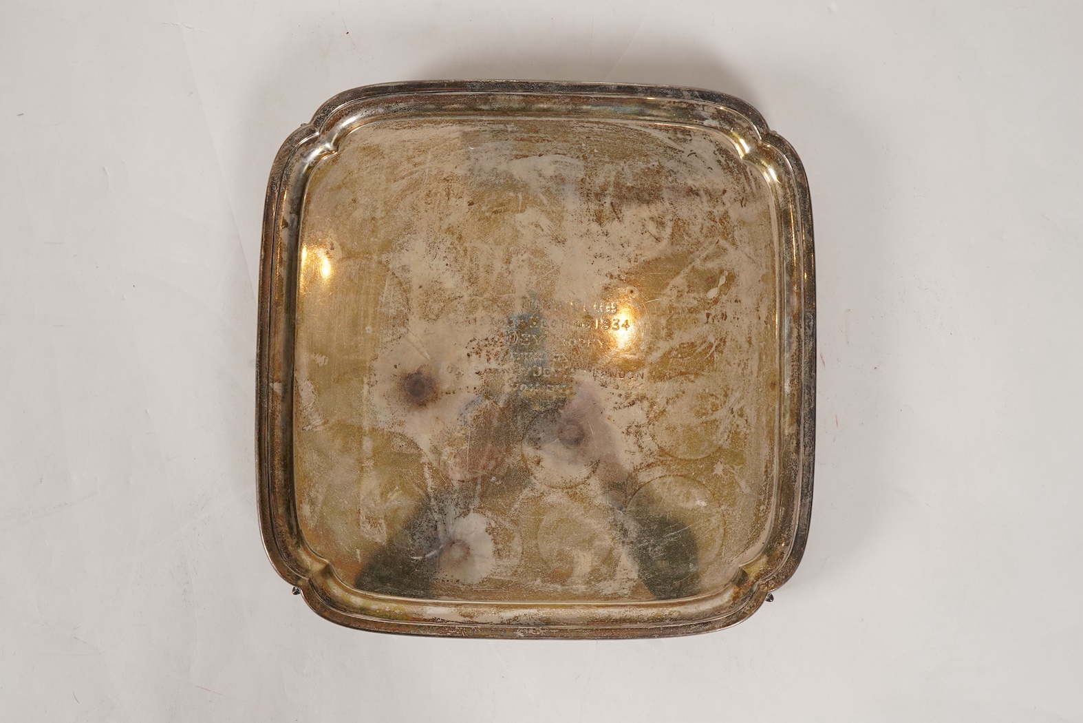 A George V silver salver by Sir John Bennett Ltd